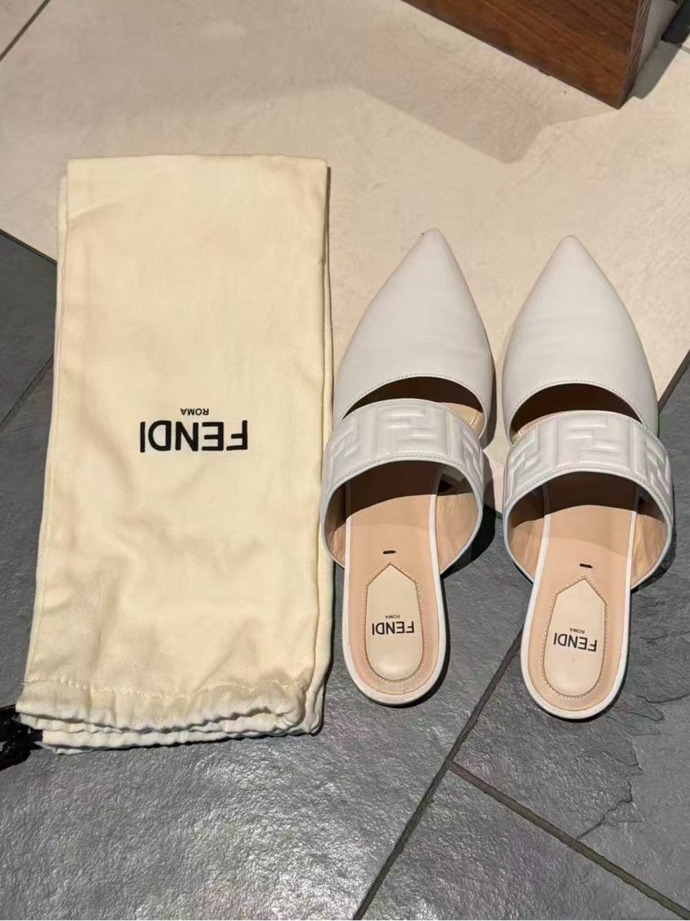 Fendi Vitello FF Embossed Buckle Flat Mules 37 Snow